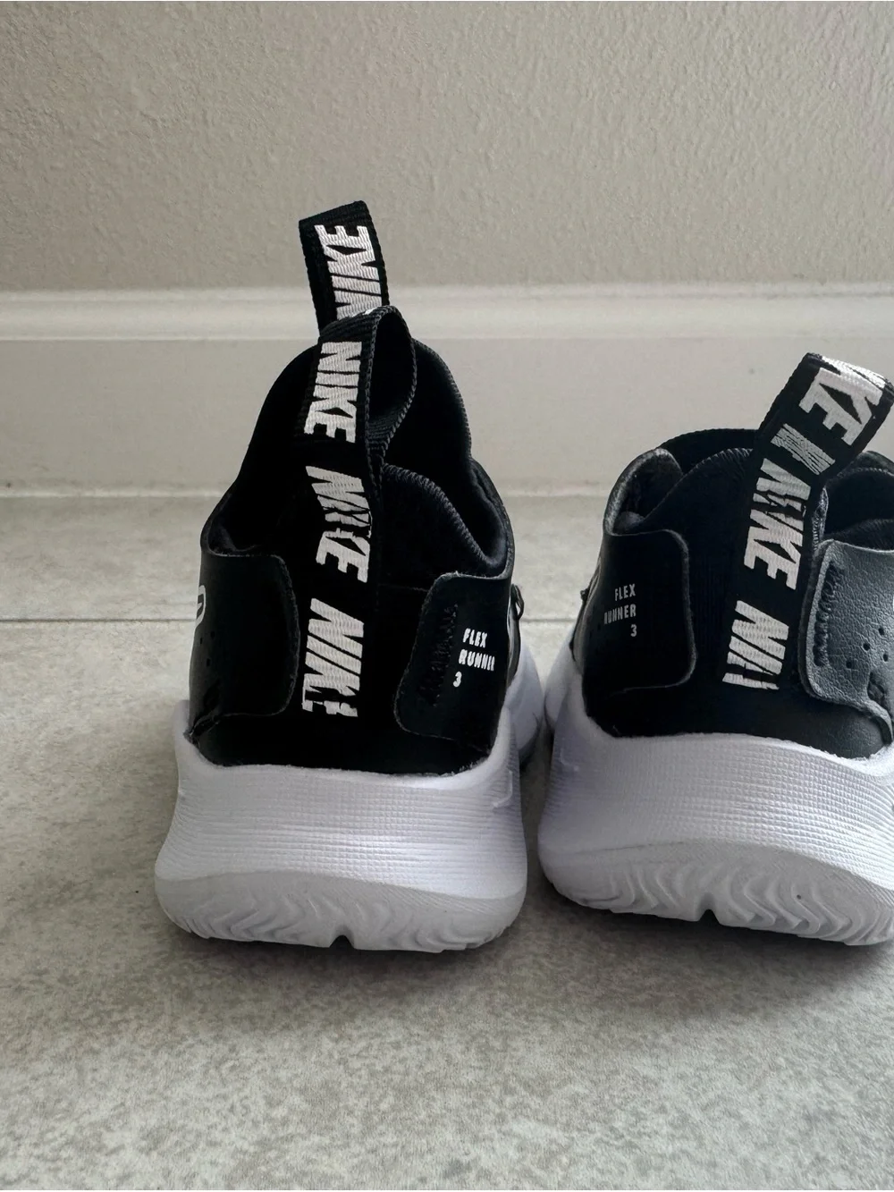 Nike Black & White Kids Slip-On Sneakers
